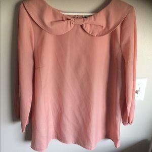 Pink collared blouse